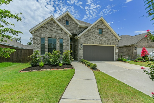 craftsman-style house with a front yard and a garage