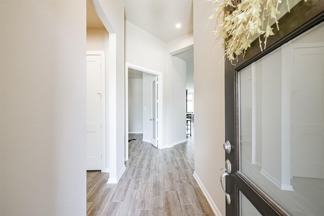 hallway featuring light wood-type flooring