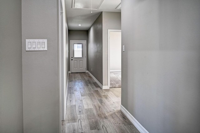 hallway featuring light hardwood / wood-style floors