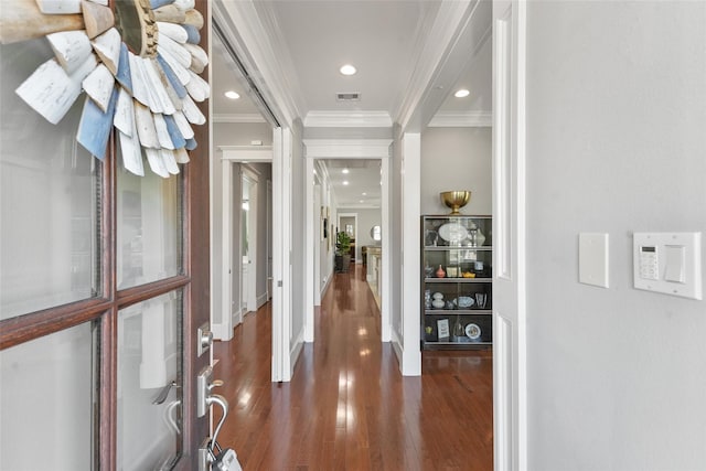 entrance foyer featuring dark hardwood / wood-style floors and ornamental molding