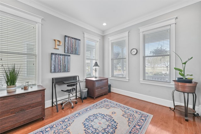 interior space with light hardwood / wood-style floors and ornamental molding