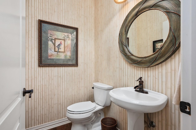 bathroom with toilet and sink