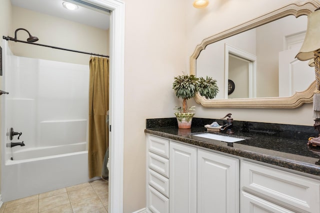 bathroom featuring vanity, tile patterned floors, and shower / bathtub combination with curtain