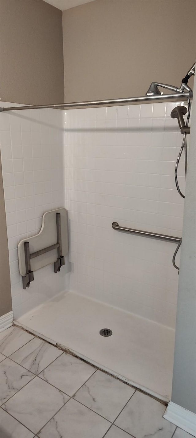 bathroom with a shower