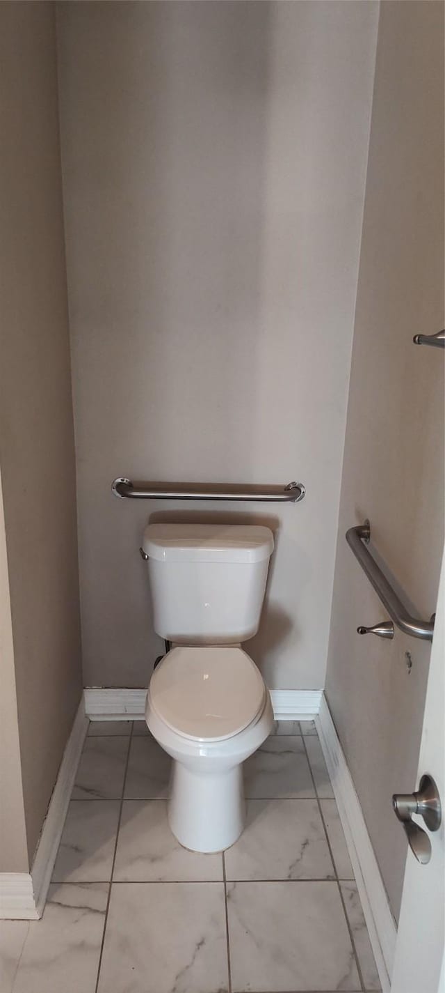 bathroom featuring toilet