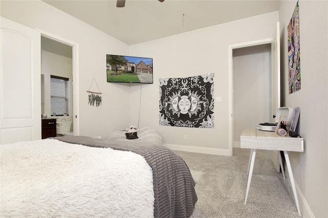 bedroom featuring ceiling fan, carpet floors, and ensuite bathroom