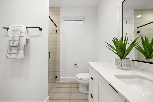 bathroom with walk in shower, tile patterned floors, vanity, and toilet