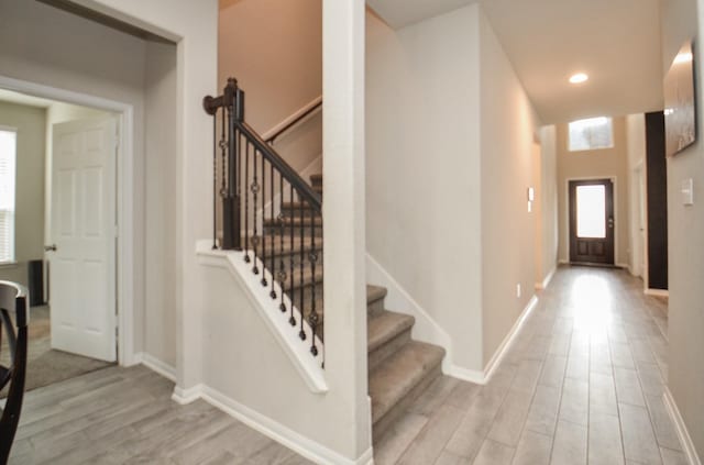 entryway with light hardwood / wood-style floors