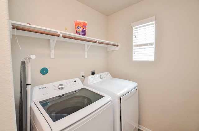 laundry room featuring independent washer and dryer