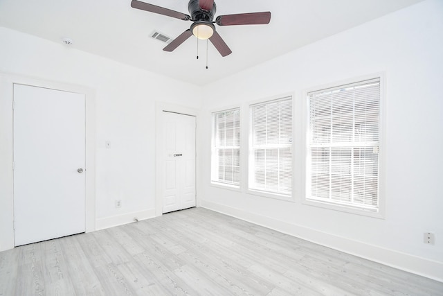 unfurnished room featuring ceiling fan and light hardwood / wood-style flooring