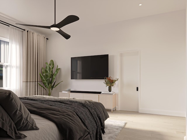 bedroom featuring ceiling fan and light wood-type flooring