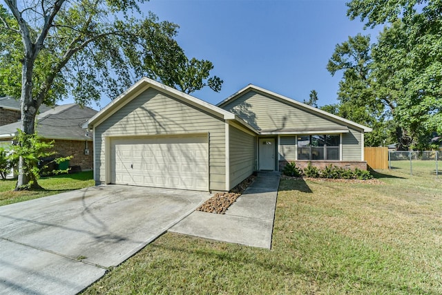 ranch-style home featuring a front lawn and a garage