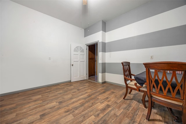 office space with dark wood-type flooring