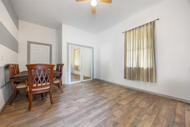 dining space featuring ceiling fan and wood-type flooring