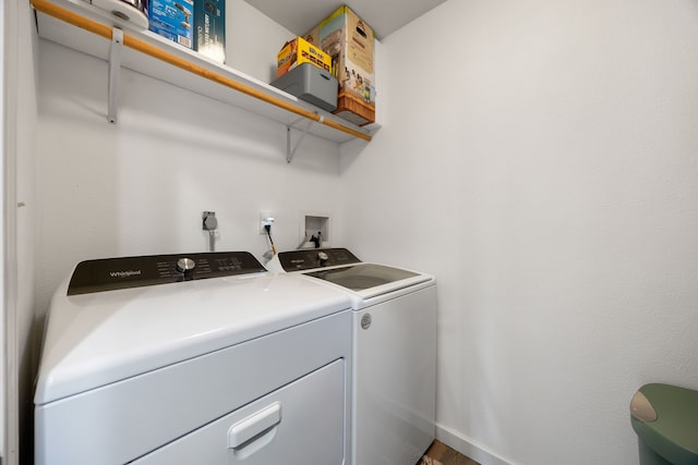 laundry area featuring washing machine and dryer