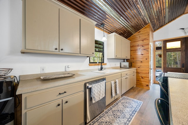 kitchen with decorative light fixtures, dishwasher, light wood-type flooring, and cream cabinets