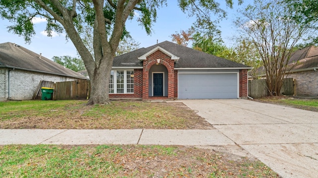 ranch-style house featuring a garage