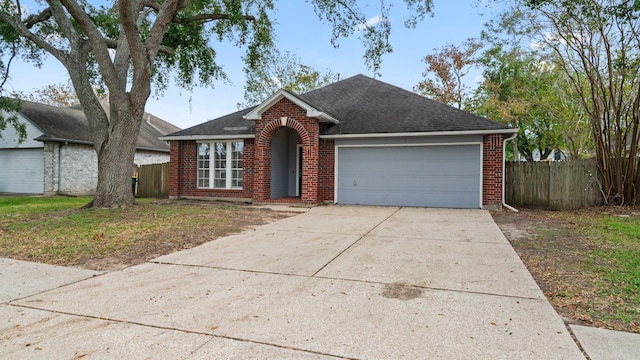 single story home with a garage