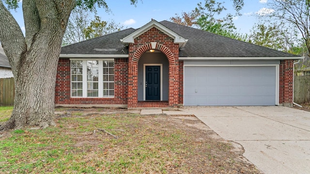 ranch-style house featuring a garage