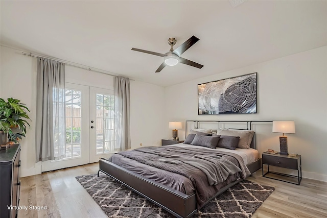 bedroom with access to exterior, french doors, light hardwood / wood-style floors, and ceiling fan