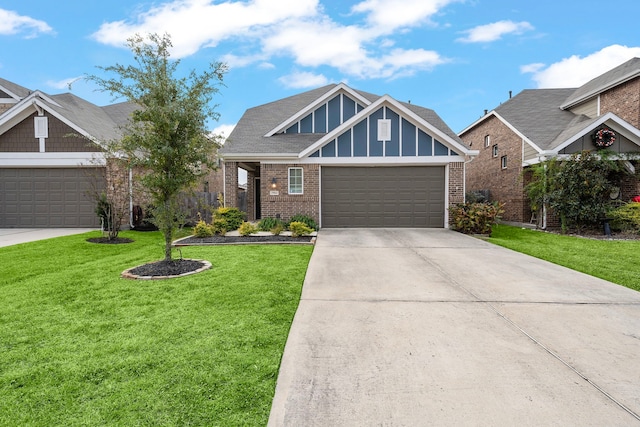 view of front facade with a front yard and a garage