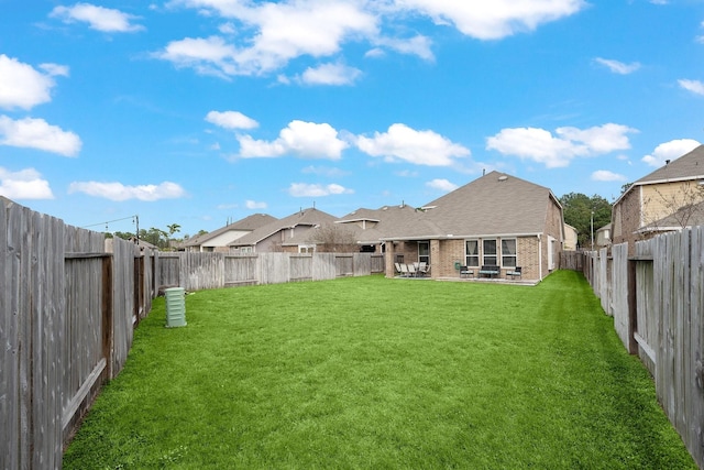 back of house featuring a lawn