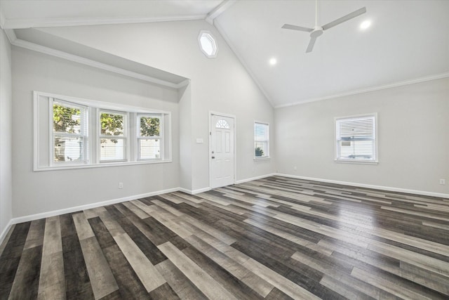 unfurnished living room featuring a healthy amount of sunlight and dark hardwood / wood-style floors