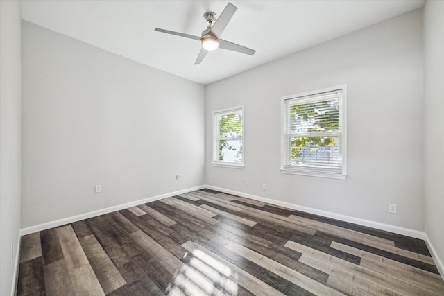 unfurnished room with ceiling fan and wood-type flooring