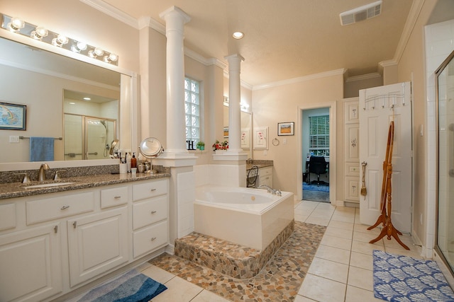 bathroom featuring tile patterned floors, ornate columns, ornamental molding, vanity, and separate shower and tub