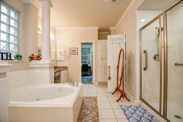 bathroom with tile patterned flooring, vanity, ornate columns, and ornamental molding