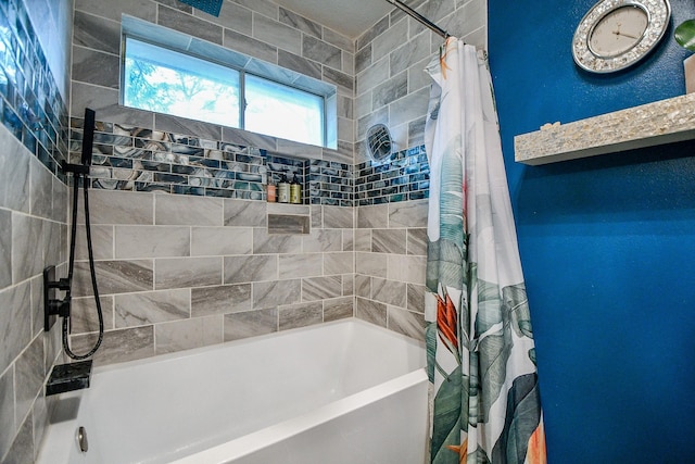 bathroom featuring shower / bathtub combination with curtain