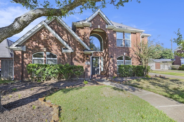 view of front of property with a front lawn