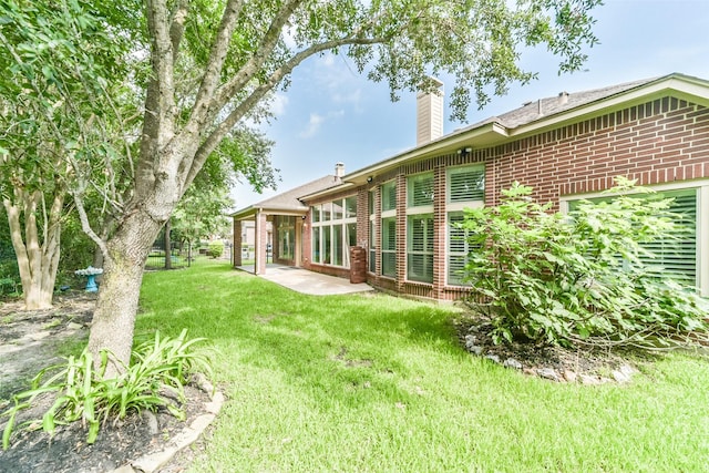 view of yard with a patio