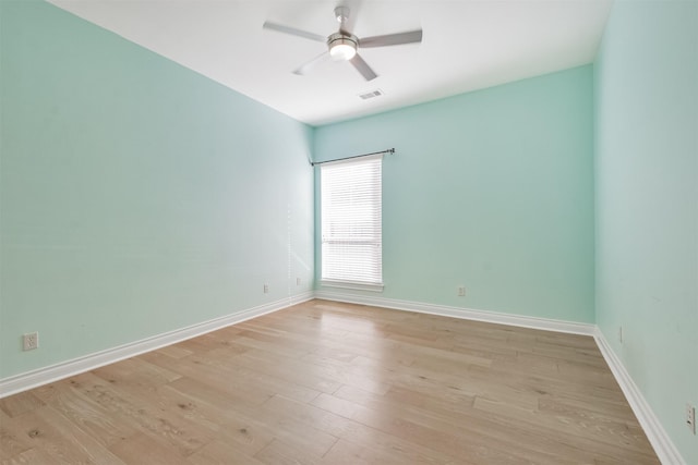 unfurnished room with ceiling fan and light hardwood / wood-style floors