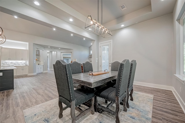 dining area featuring light wood-type flooring