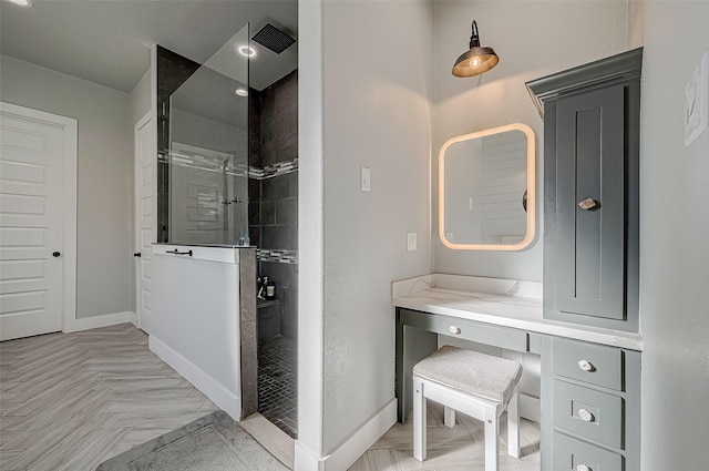 bathroom featuring a tile shower