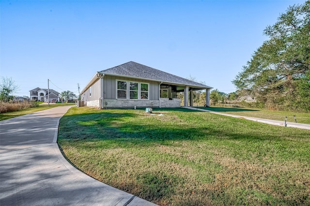 view of front of home with a front yard