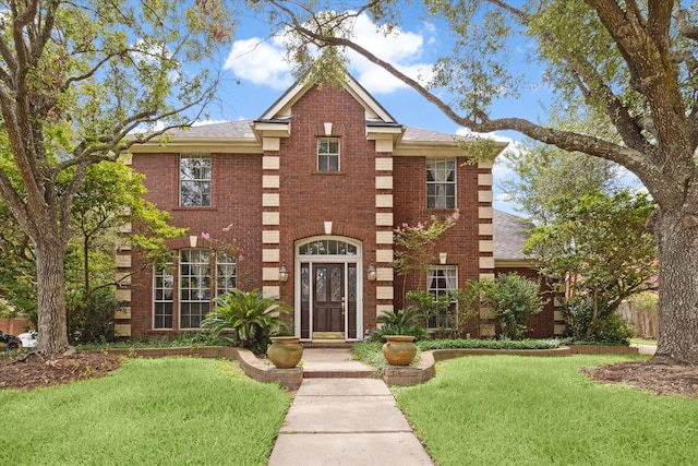 view of front of house with a front lawn