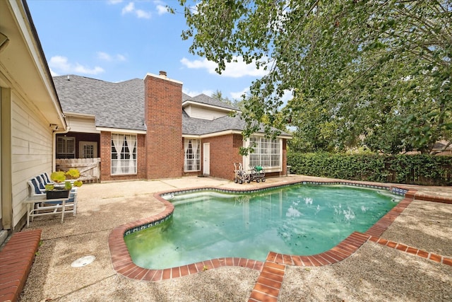 view of pool with a patio area