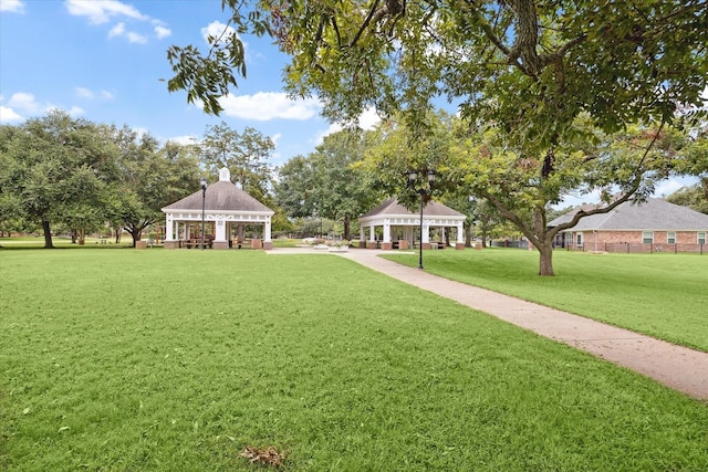 view of community with a gazebo and a yard