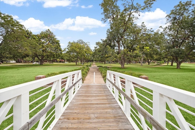 surrounding community featuring a yard