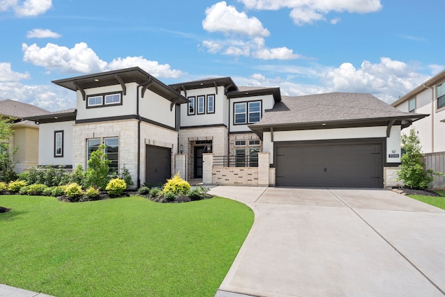 prairie-style home featuring a front lawn