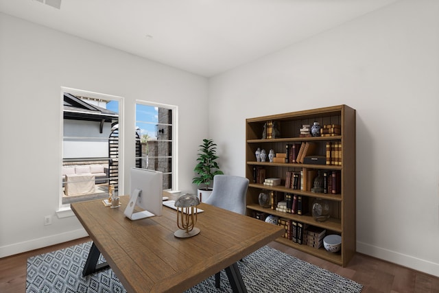 office area with dark hardwood / wood-style flooring