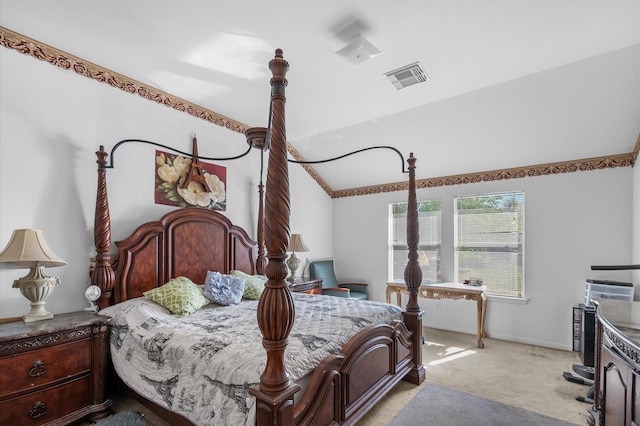 bedroom with light carpet and lofted ceiling