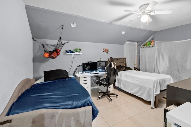 tiled bedroom with ceiling fan and lofted ceiling