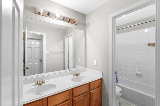 full bathroom featuring vanity, toilet, and shower / bath combo with shower curtain