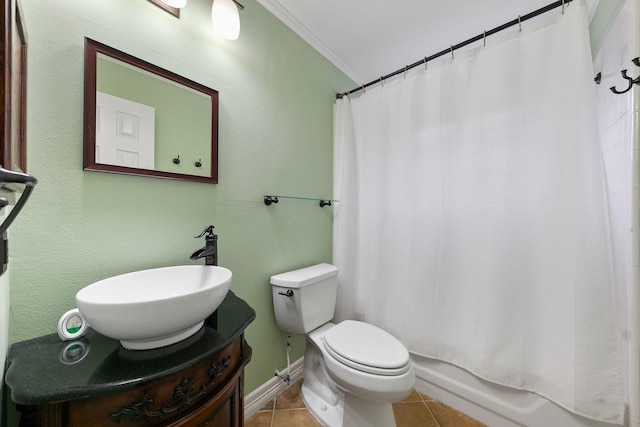 full bathroom with shower / bath combo, ornamental molding, vanity, tile patterned flooring, and toilet