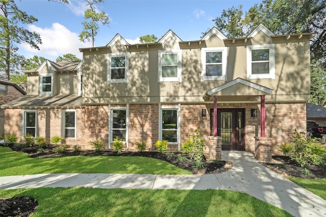 view of front of house with a front lawn