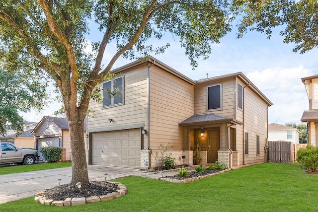 view of front of house featuring brick siding, driveway, a front yard, and fence