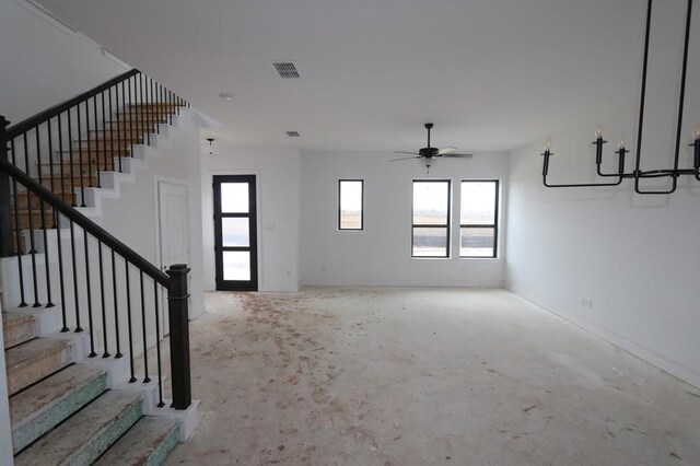 3411 Loam Ln, Richmond, TX 77406 - unfurnished living room with stairs and ceiling fan